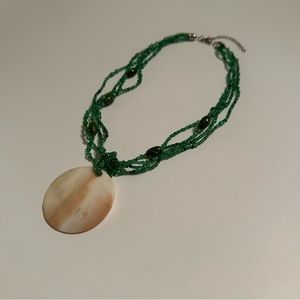 Green beads necklace.
